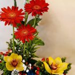 Arreglo de base de madera Gerberas rojas
